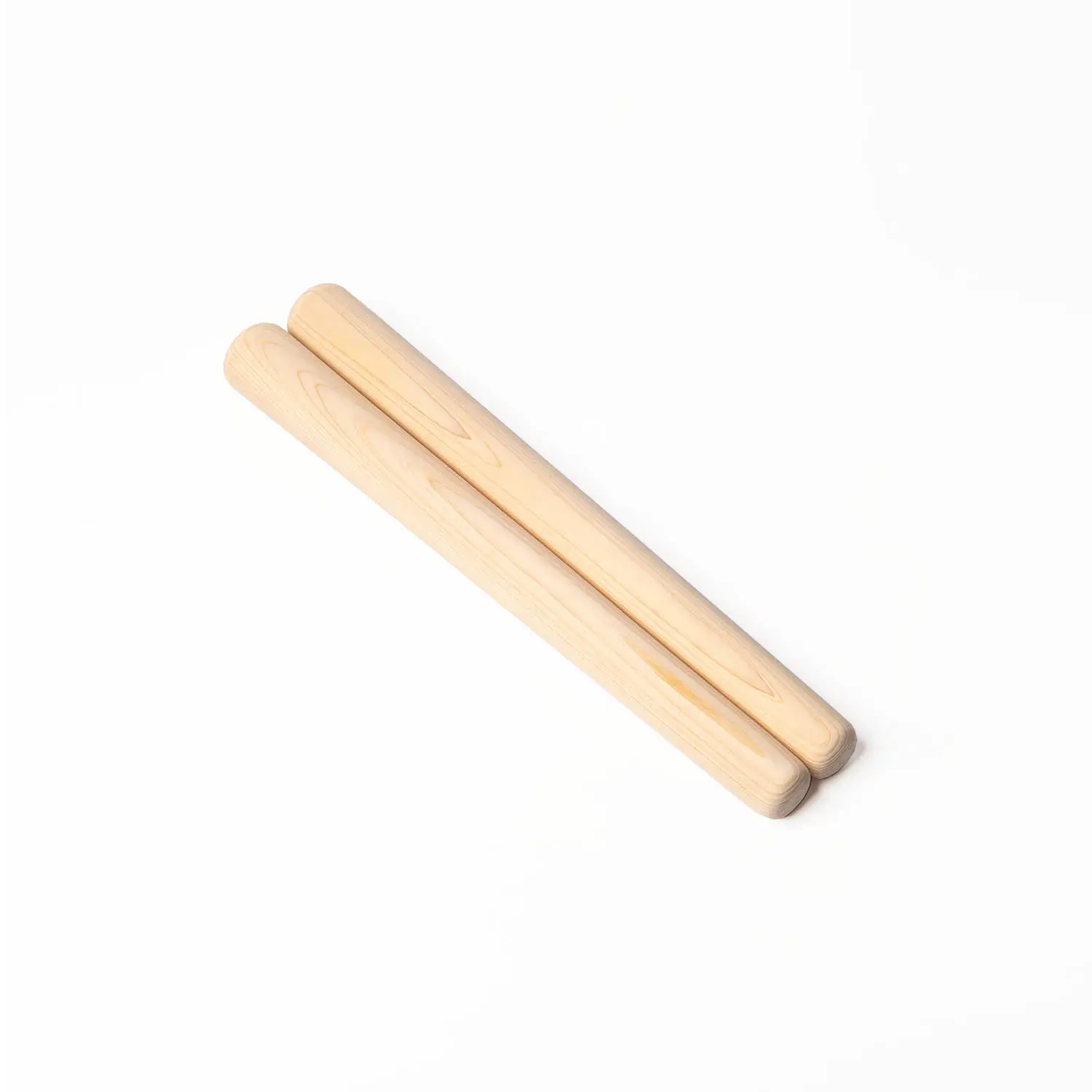 JINLEI hinoki tapered bachi for nagado taiko - pair of Japanese cypress drumsticks lying side by side showing smooth tapered profile