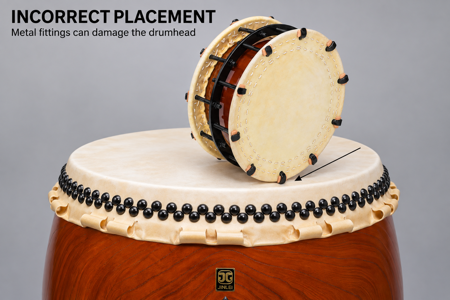 Incorrect placement of a bolt-tensioned Shime Daiko with metal fittings contacting a Nagado drumhead