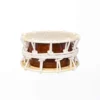 JINLEI 2Cyougake Shime Daiko rope drum front view showing natural cowhide drumhead with stitched leather rim, white twisted rope tension lacing with decorative knots and amber lacquered wood shell