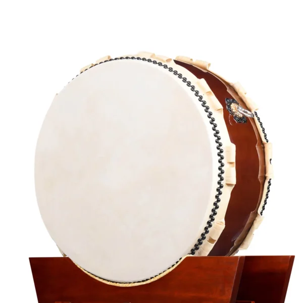 JINLEI O-Hira Daiko Kapiac large flat drum front view showing wide cowhide drumhead with black bead tacking, rawhide lacing and warm reddish-brown kapiac wood shell mounted on mahogany yagura stand