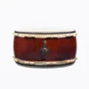 JINLEI O Hira Daiko Kurinuki drum full front view showing wide low-profile body with cowhide drumhead, double-row black bead tacking, rawhide lacing and deep burgundy wood shell with ornate black and gold hardware