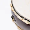 Close-up of JINLEI O Hira Daiko Kurinuki drum showing double-row black bead tacking, natural rawhide lacing and ornate black cast iron diamond hardware with gold accent on deep burgundy wood shell