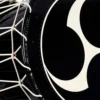 JINLEI O-Shime daiko, close-up detail of tomoe pattern on drumhead with white rope tuning and glossy black lacquered rim