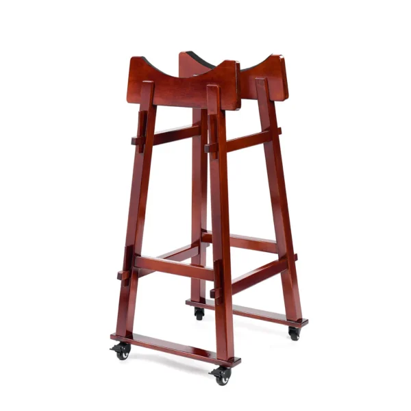 JINLEI Yagura Tower Stand for Nagado Daiko full view showing tall mahogany-finished wood frame with curved drum cradle, cross-beam supports and lockable rubber caster wheels