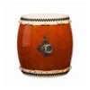 Nagado Daiko Ash Wood hollowed-out solid wood drum front view showing glossy barrel-shaped body with swirling grain pattern, black bead tacking and ornate iron ring hardware