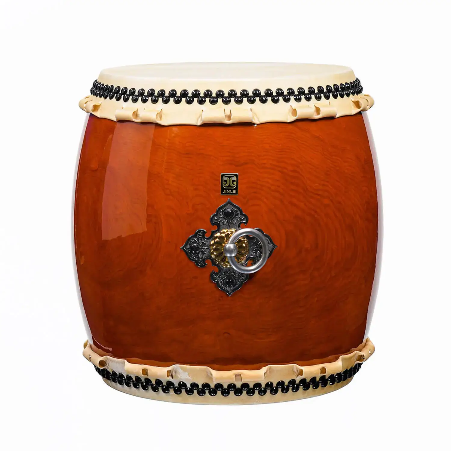 Nagado Daiko Ash Wood hollowed-out solid wood drum front view showing glossy barrel-shaped body with swirling grain pattern, black bead tacking and ornate iron ring hardware
