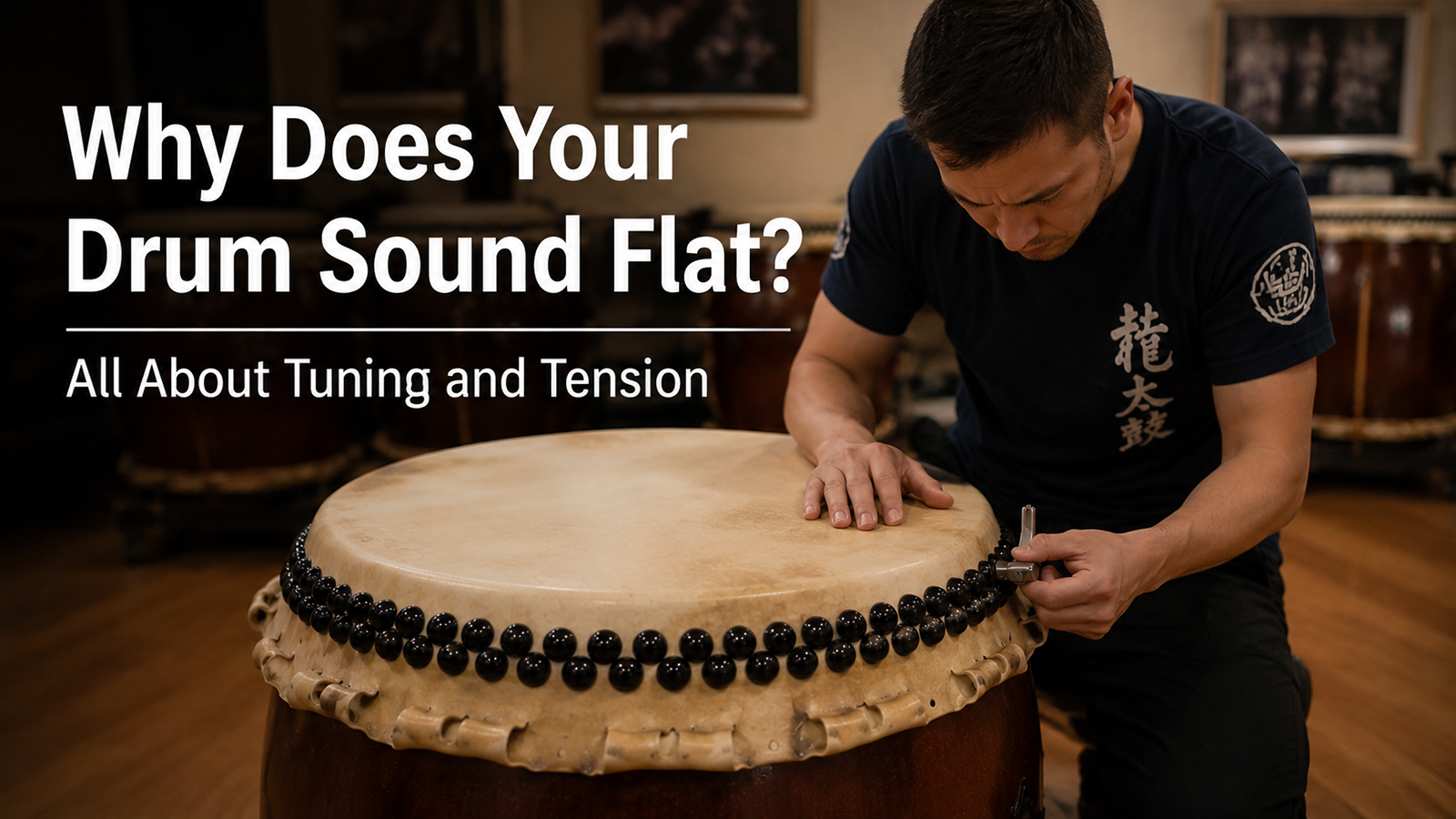A man carefully tuning the edge of a Nagado Daiko drum using a specialized tool. The image features overlay text that reads "Why Does Your Drum Sound Flat? All About Tuning and Tension."